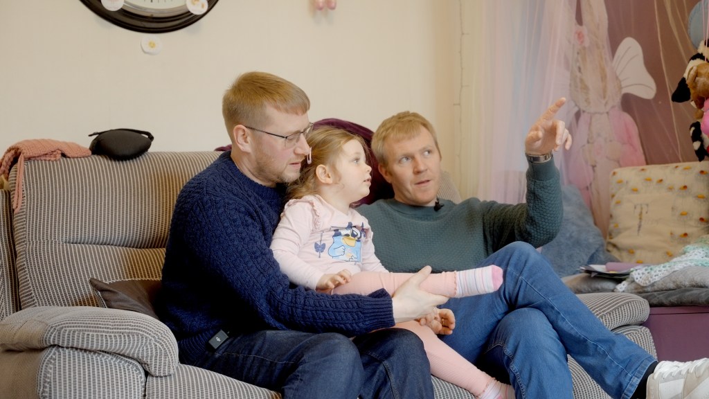 Two dads and their daughter